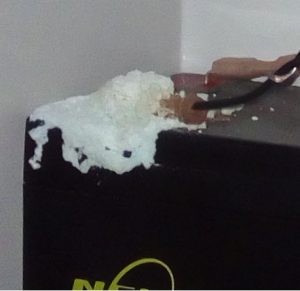 corroded alarm system battery